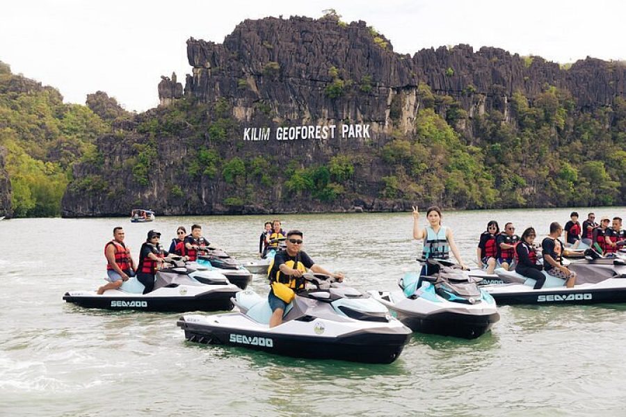 Travelers on a jetski tour in the Kilim Geoforest, Langkawi